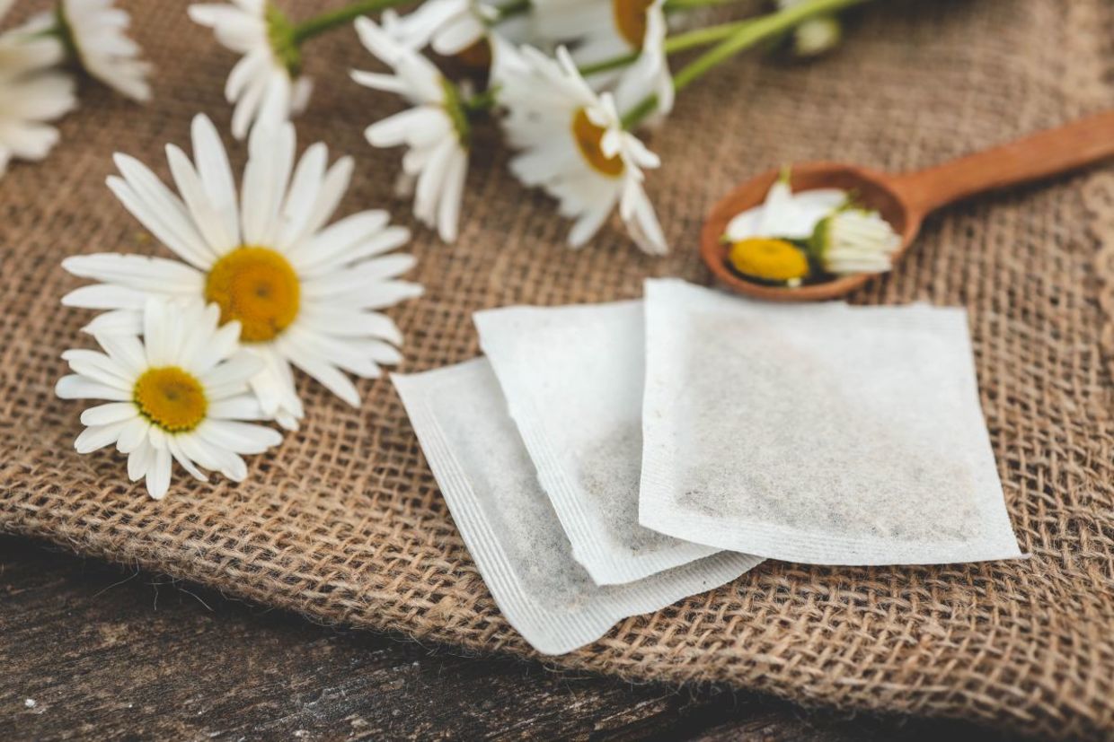 Add some used chamomile tea bags to your bath. Add some used chamomile tea bags to your bath.