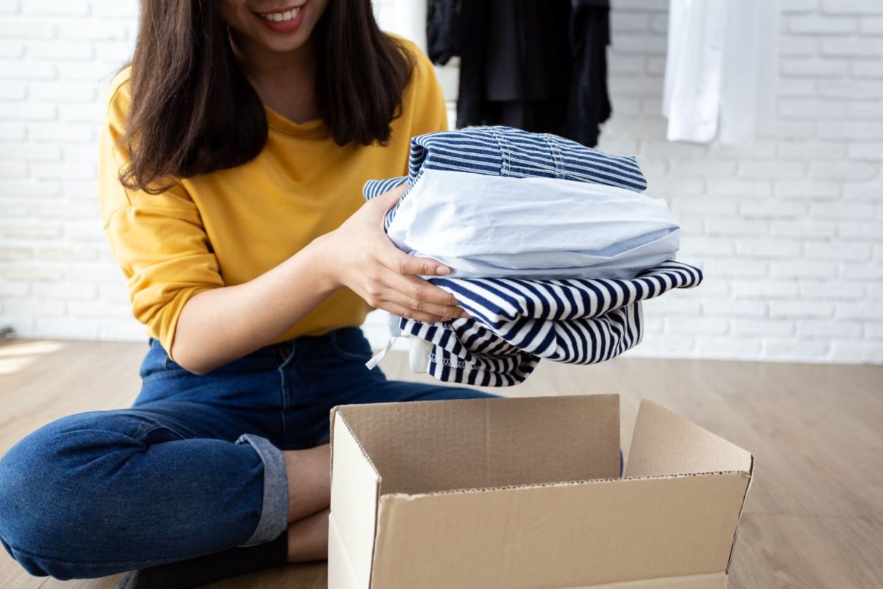 Getting clothing ready to donate.